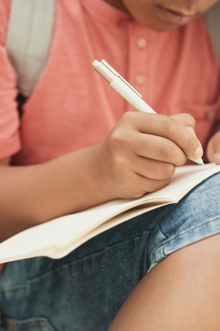 Illustrative image: young people working on a learning activity.